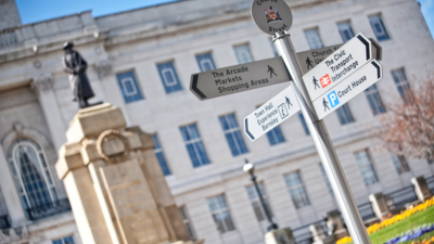 sign post in front of barnsley town hall